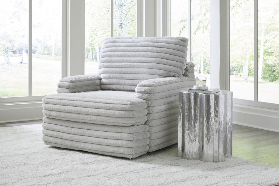 Grey chair store with ottoman