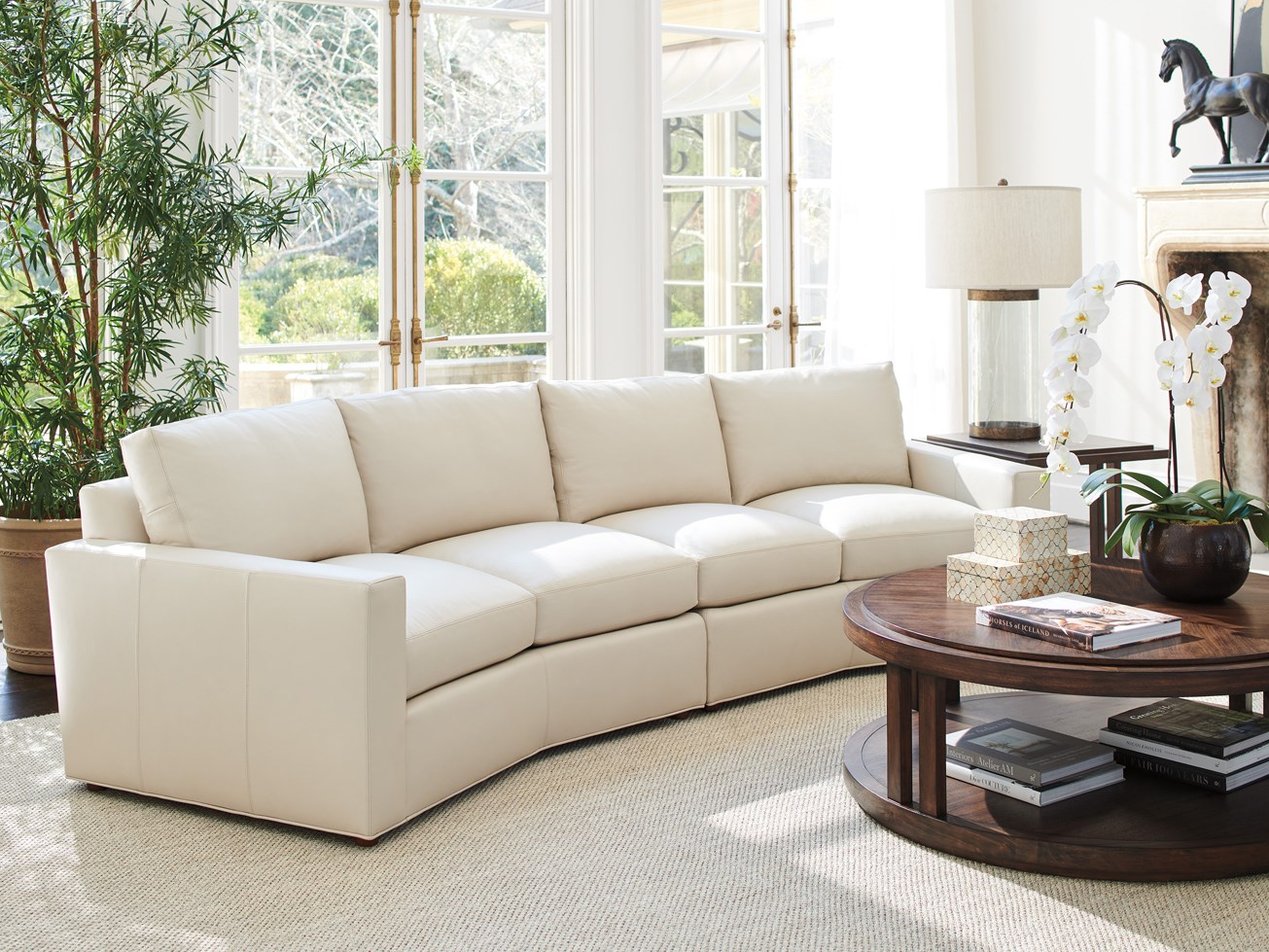 Curved leather on sale sectional sofa