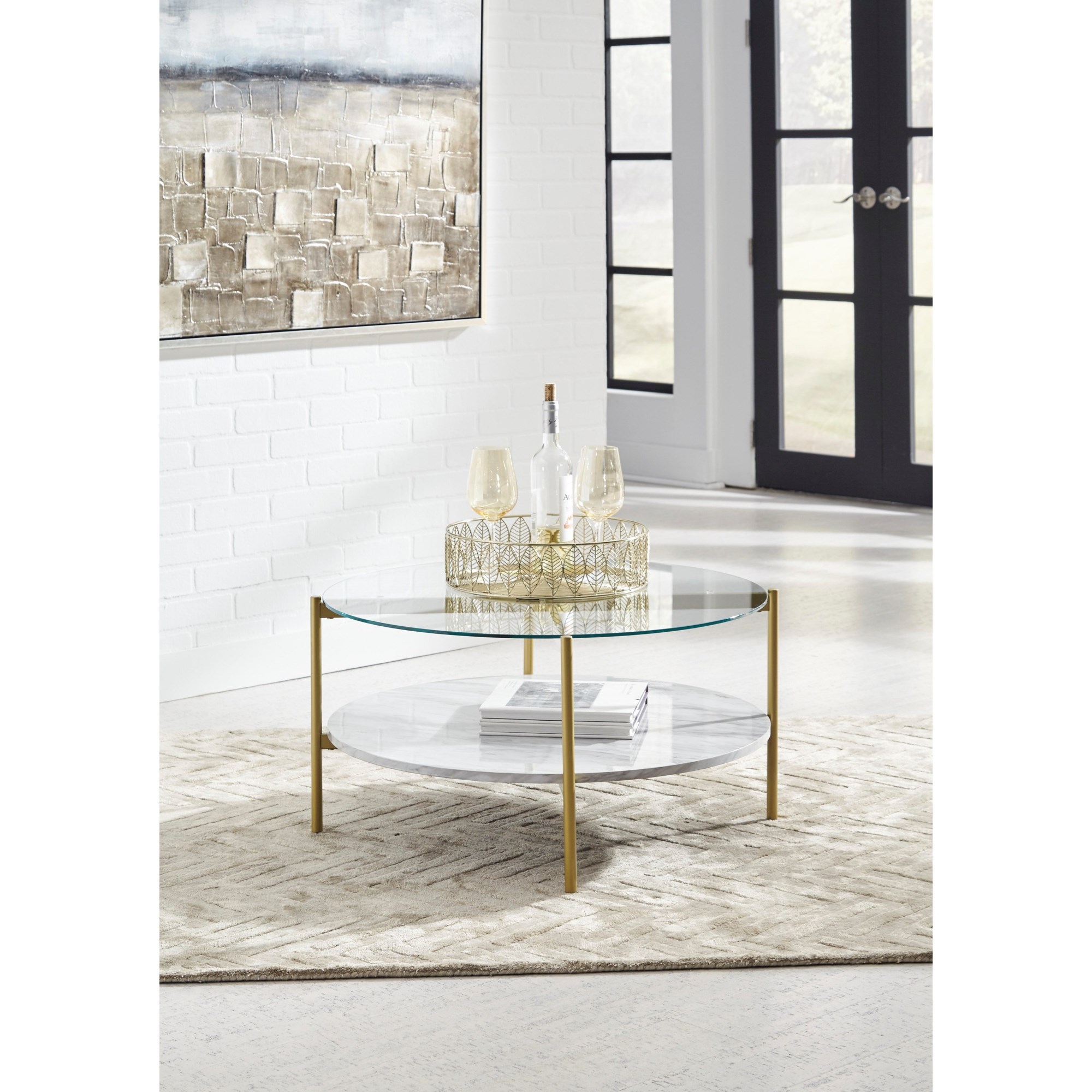 Signature Design by Ashley Wynora T192-8 Gold Finish Round Cocktail Table  with Glass Top and Faux Marble Shelf | HomeWorld Furniture |  Cocktail/Coffee Tables
