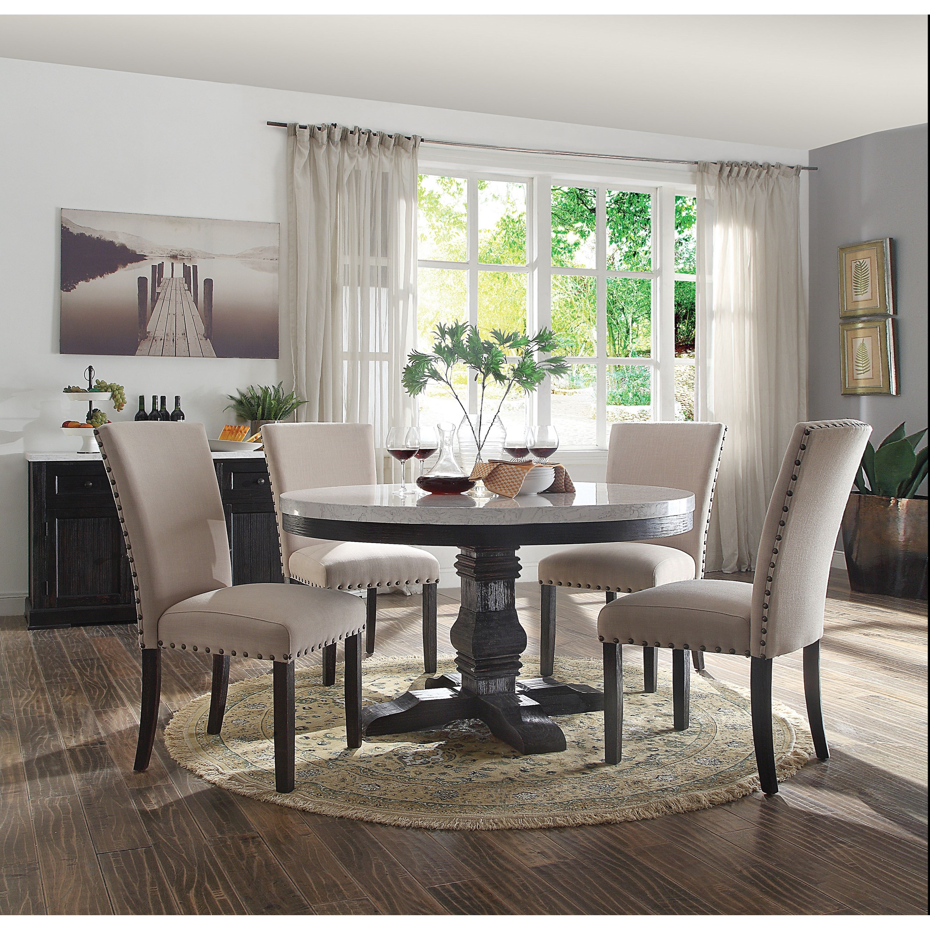 Nolan round pedestal online dining table
