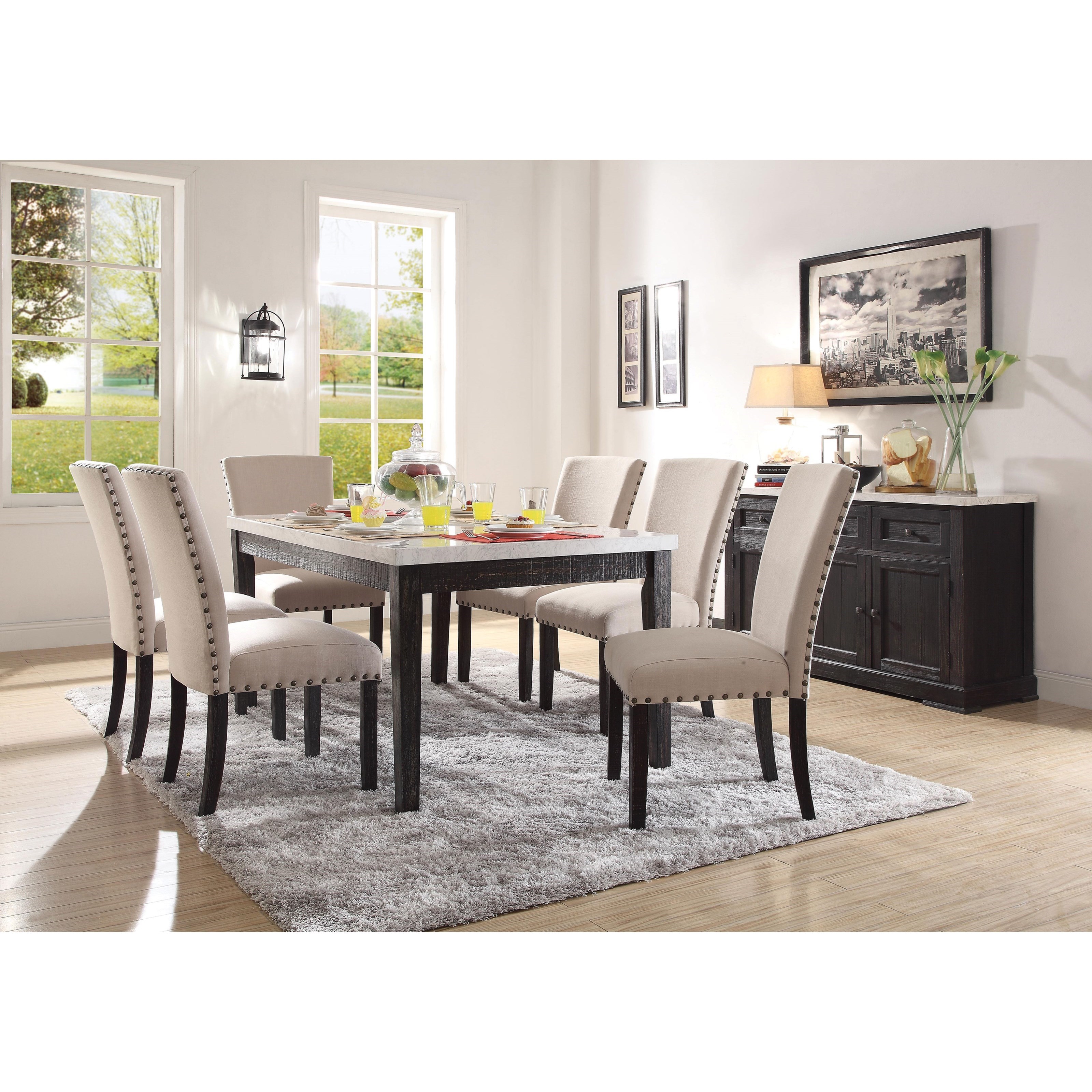 Nolan round deals dining table