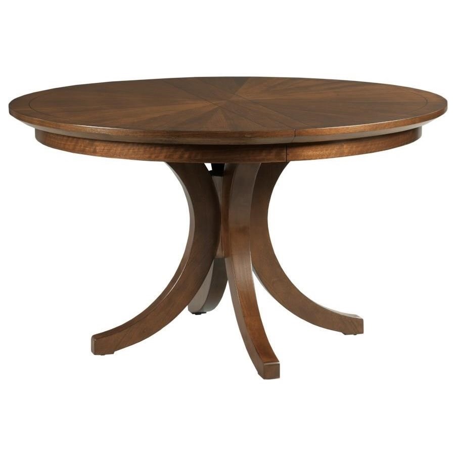 Round dining table with a leaf outlet