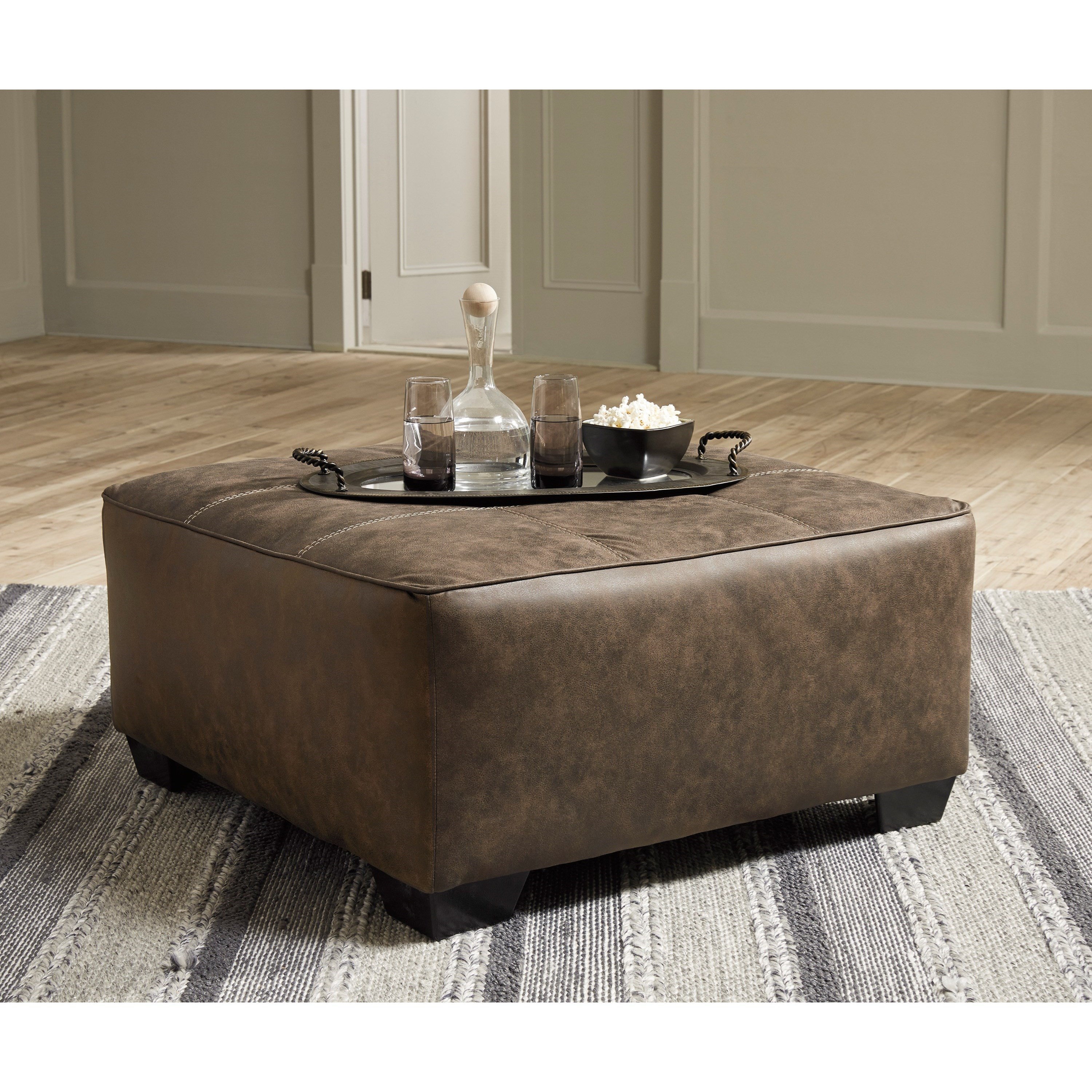 Oversized brown store leather ottoman