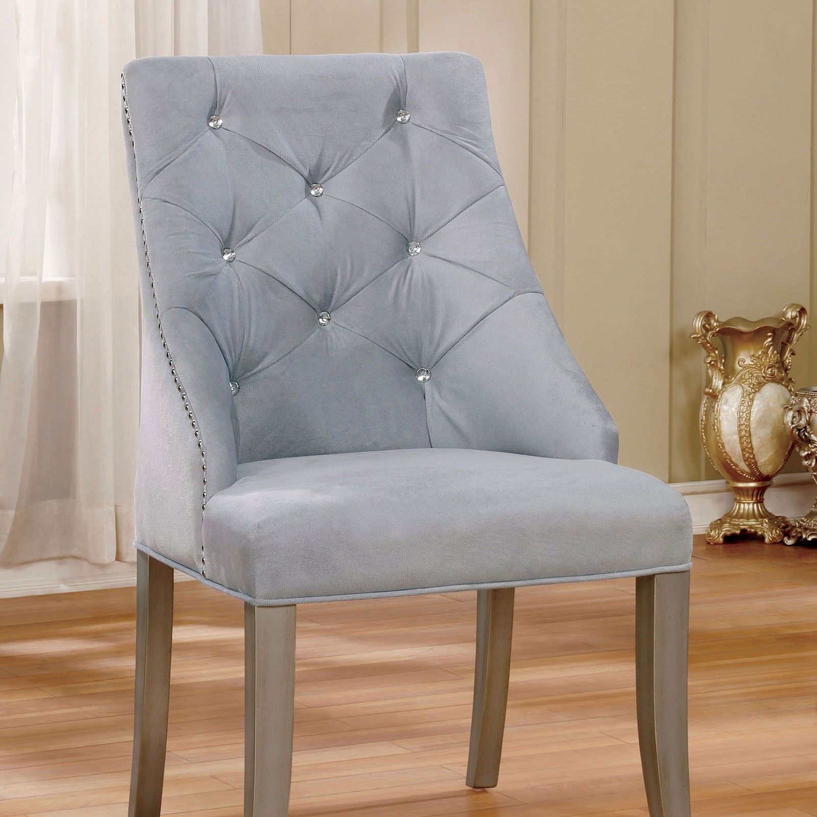 Silver tufted deals chair
