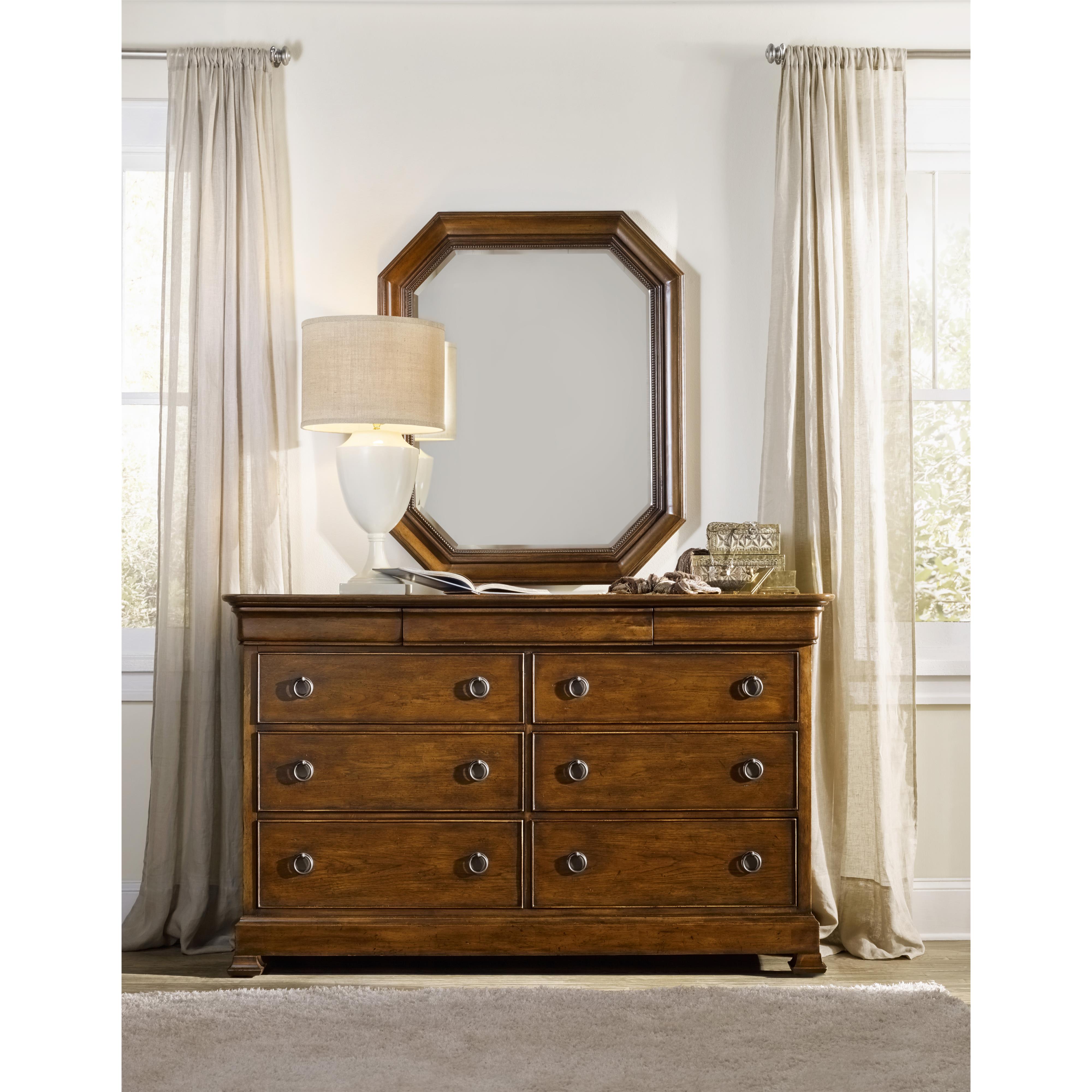 Dresser with hidden clearance storage