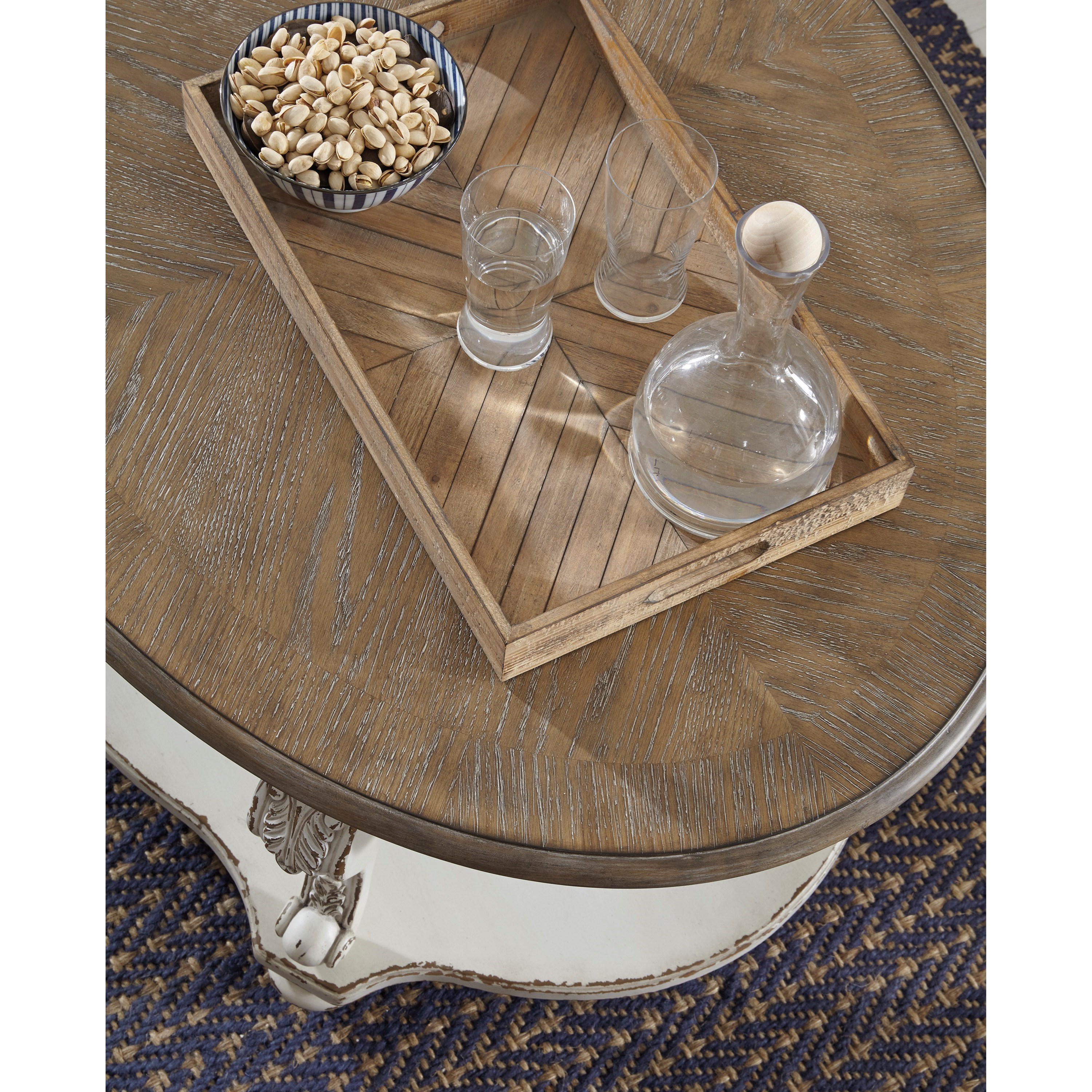 Realyn Oval Cocktail Table