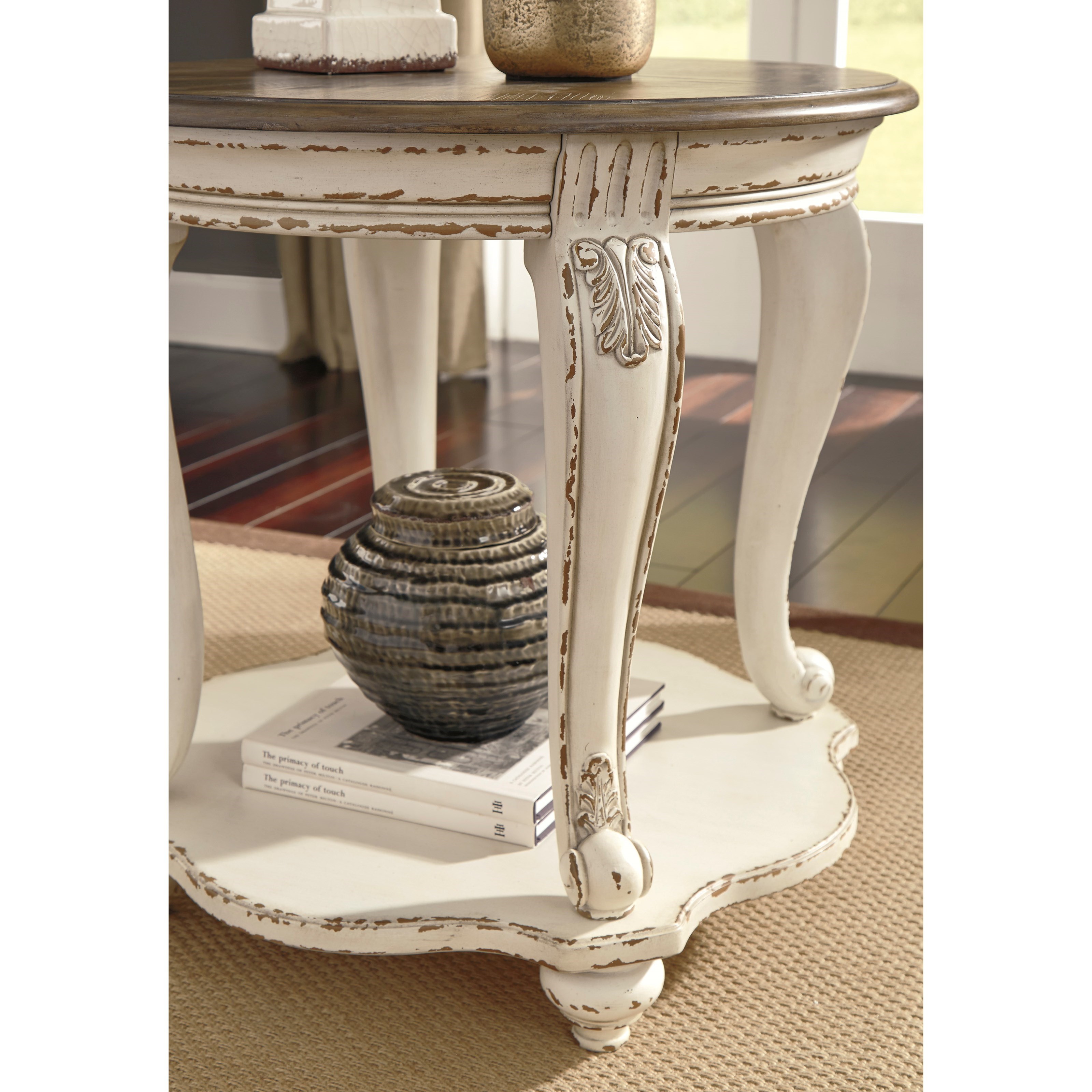 Ashley furniture sales realyn sofa table