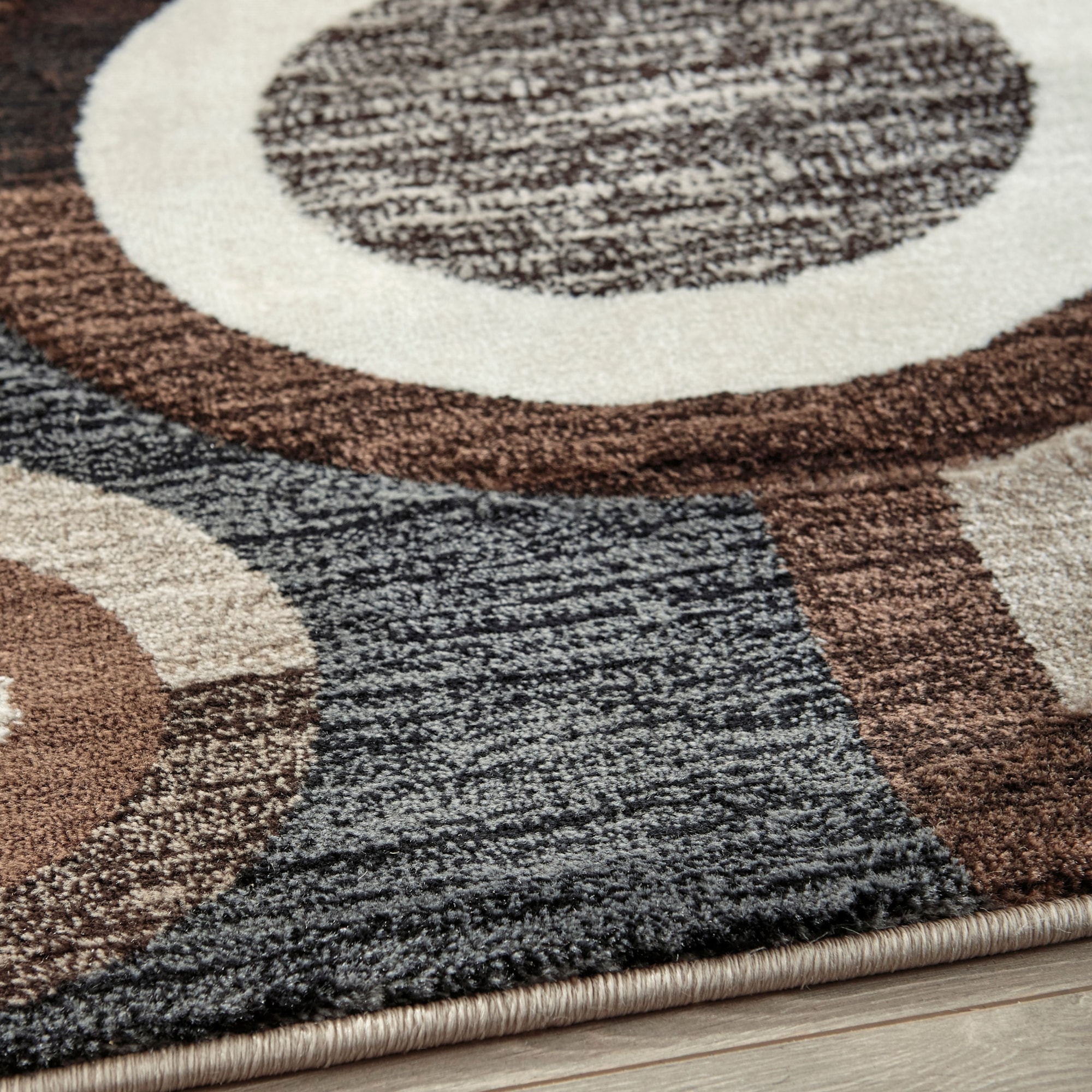 Benchcraft Contemporary Area Rugs 136859 Guintte Black/Brown/Cream 